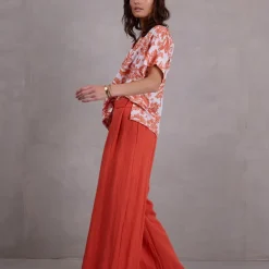 Faro broderie blouse in shiny orange